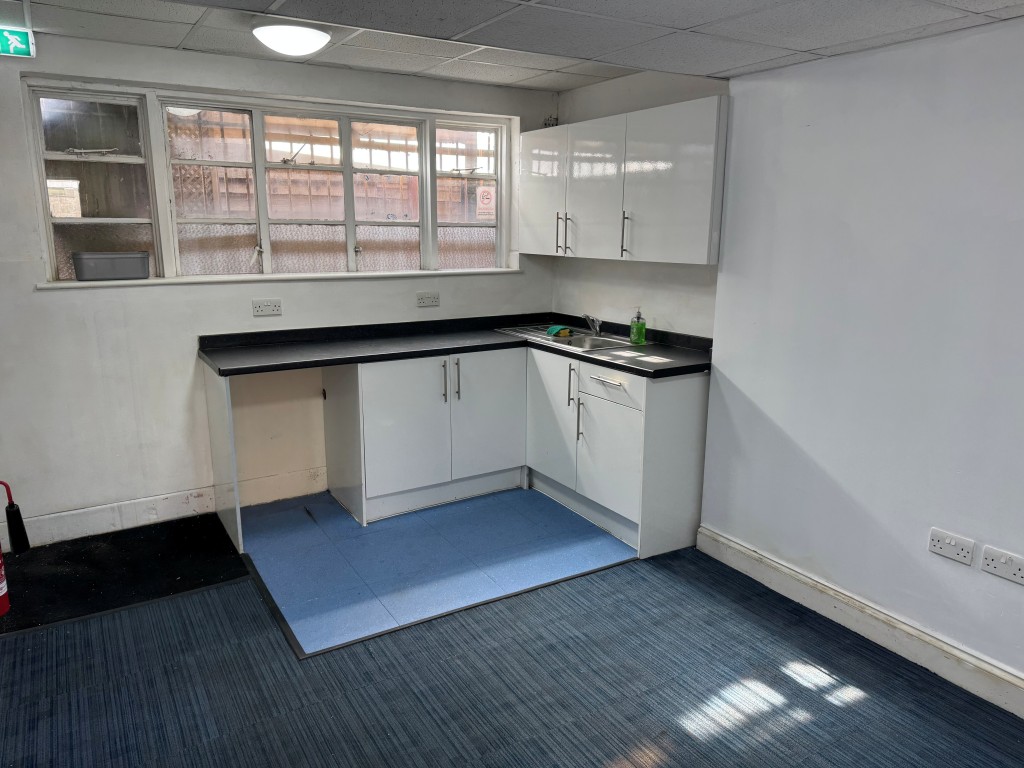 Lot: 39 - FREEHOLD TOWN CENTRE RETAIL UNIT FOR INVESTMENT OR OCCUPATION - Rear Kitchen/Meeting Room